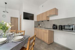 Eleganckie i Stylowe Apartamenty Niedaleko Rynku w Poznaniu by Noclegi Renters