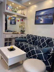 EaseStay by Bren in Shell Residences MOA