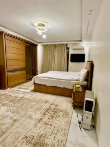 Modern 3BR Apartment - Prime Dokki Location