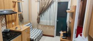 Green pramuka by Santoso Family