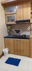 Green pramuka by Santoso Family