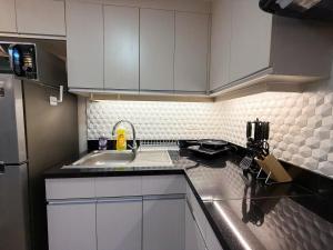 Modern 1BR Unit in Abreeza Place T2 with Paid Parking