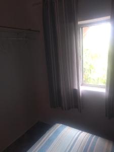 Casa no centro São Thomé das letras pra 4 pessoas