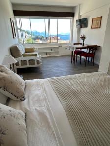 Mono ambiente con vista al lago