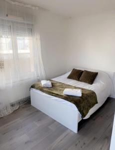 Appartements Appartement avec balcon a 2 pas la gare : photos des chambres