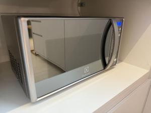 Apartamento com Suíte e sala climatizada