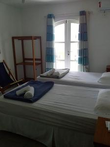 Spazio Itaúna Pousada