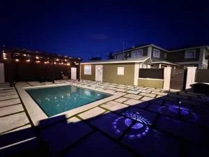 Island Haven 5BR Home with Pool Cottage - Behring Point