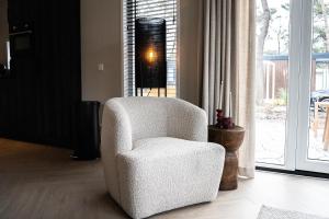 Luxe chalet 5p met hottub midden in het bos - Boshuisje Casa Kuin