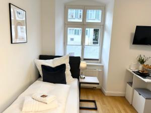 BELLA - Business&Family Ap 5, 100m zum Konzerteingang Schloß, Parkplatz, SmartTV, Netflix, Waschmaschine,24h Checkin, 30qm