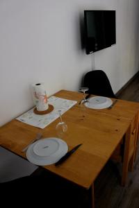Appartements Au pied des Thermes : photos des chambres