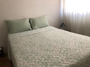 Quarto em Apartamento
