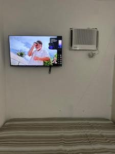 Kitnet com ar condicionado na quadra da praia e wifi
