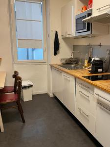 Appt 2 chambres au centre ville 3è