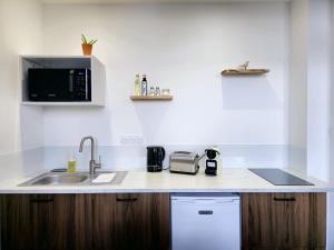 Appartements La Suite des Canotiers : photos des chambres