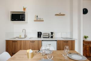 Appartements La Suite des Canotiers : photos des chambres
