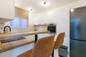 Apartments with parking space Trogir - 23849