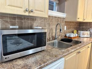 Lovely 2BR BSMT Suite w Parking for Pickup
