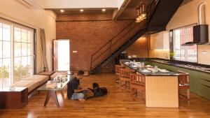 SaffronStays Deckhouse 47 - 3BR pet-friendly industrial-style pool villa with bonfire, BBQ, rain dance & celebration turf