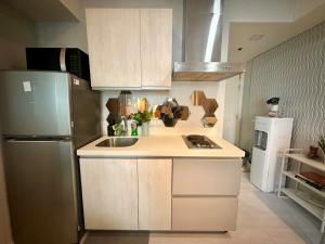 Beach Condo at Azure Urban Resort with SmartTV