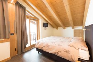 BAITA NICOLETTA Dream Attic - Breta Holidays SPA Apartments