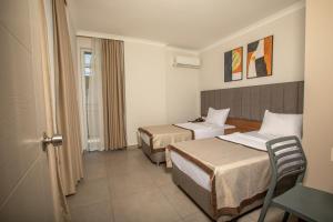 Junior Suite with Balcony (A/C included) room in Perle Apart Hotel