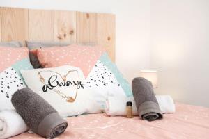 Appartements Les Sorbiers - CENTRE VILLE - Spacieux & Climatisation : photos des chambres