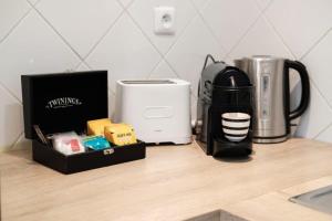 Appartements Les Sorbiers - CENTRE VILLE - Spacieux & Climatisation : photos des chambres