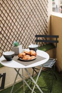 Appartements Les Sorbiers - CENTRE VILLE - Spacieux & Climatisation : photos des chambres