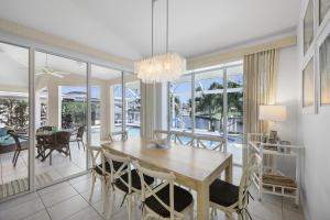 Luxuriously furnished waterfront home with poolspa