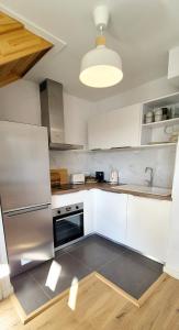 Appartements LE NID DU TEICH Duplex COSY ET CENTRAL A 5 MINUTES DE LA GARE : photos des chambres