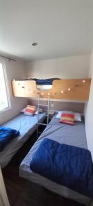 Campings Mobil home 5 personnes vue mer : photos des chambres