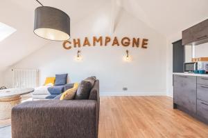 Appartements Suite Champagne : photos des chambres