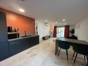 Appartements Le petit Mas : photos des chambres