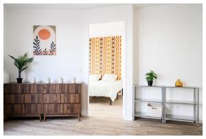 Appartements Cozy 2 pieces a 2 min du metro et 10 min de Paris : photos des chambres