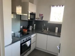 F2 avec grand balcon quartier gare - Magny-sur-Seille