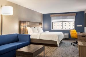 King Suite with Sofa Bed room in Holiday Inn Express Syracuse Airport an IHG Hotel