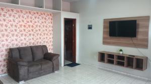 Duplex 3 quartos Ar condicionado 2 camas casal 5 camas solteiro Garagem para 3 carros proximo ao Centro e Shopping