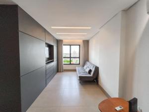 Loft Confortável e Elegante com Quarto Fechado