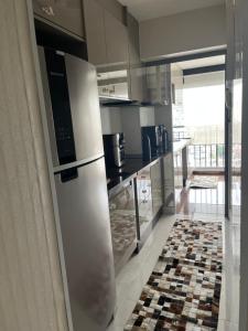 Flat sensacional 5 pessoas em condomínio moderno 2 suites climatizados