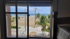 Lindo e amplo apartamento Pé na Areia - Praia Grande
