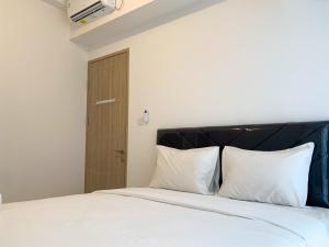 Nice and Stylish Designed 2BR at Tokyo Riverside PIK 2 Apartment By Travelio