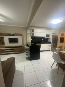 Apartamento 2 quartos sendo 1 suíte na praia dos Ingleses