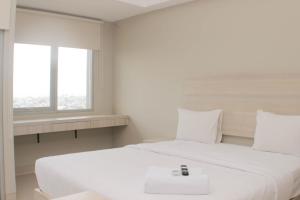 Nice Studio at Gateway Park LRT City Jatibening Apartment By Travelio