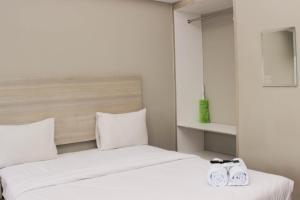 Nice Studio at Gateway Park LRT City Bekasi Apartment By Travelio