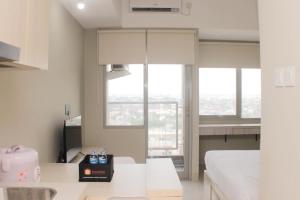 Nice Studio at Gateway Park LRT City Bekasi Apartment By Travelio