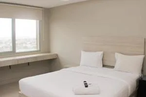 Cozy Studio at Gateway Park LRT City Bekasi Apartment By Travelio - Cibening Tiga