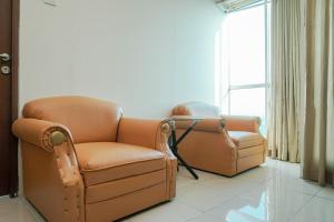 Cozy Living 1BR at Tifolia Apartment By Travelio