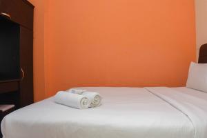 Comfort and Homey 2BR at Green Pramuka City Apartment By Travelio