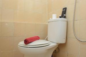 Comfort and Homey 2BR at Green Pramuka City Apartment By Travelio